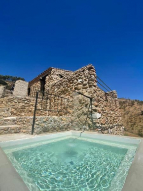 Casa de piedra, Yunquera